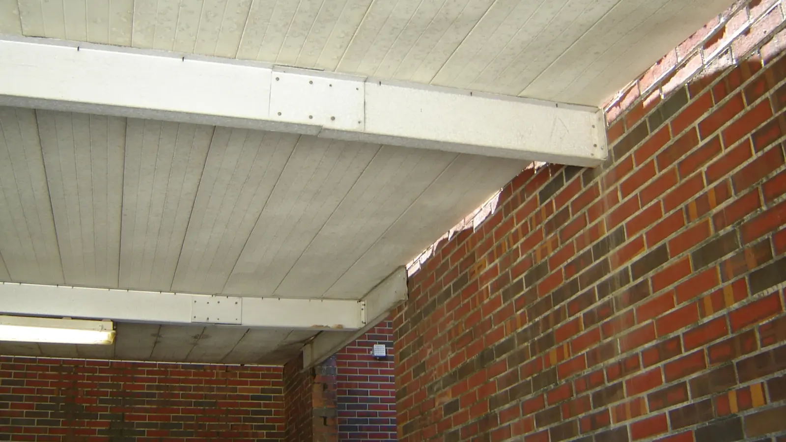 A covered brick walkway at a training facility at Corry Station, included in the Hurricane Sally Package 4 repairs.